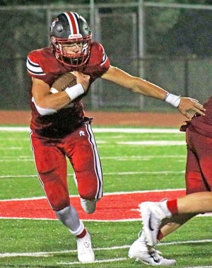 Senior Michael Blaine (2) racked up 174 yards on 22 carries and made two touchdowns to help push North Pocono to a 20-13 victory over Wyoming Valley West in the opening night of the Trojans football season.