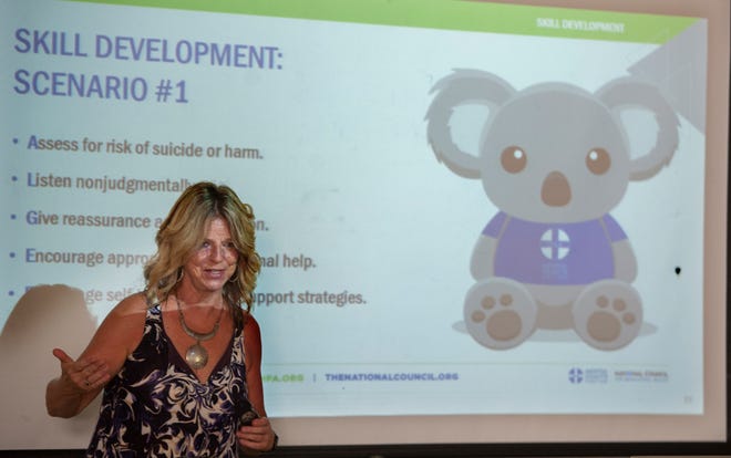 Lynne Lynch, Director of Business Operations for Shrewsbury Youth and Family Services, leads a class on mental health first aid for teachers at West Boylston Middle/High School on August 29.