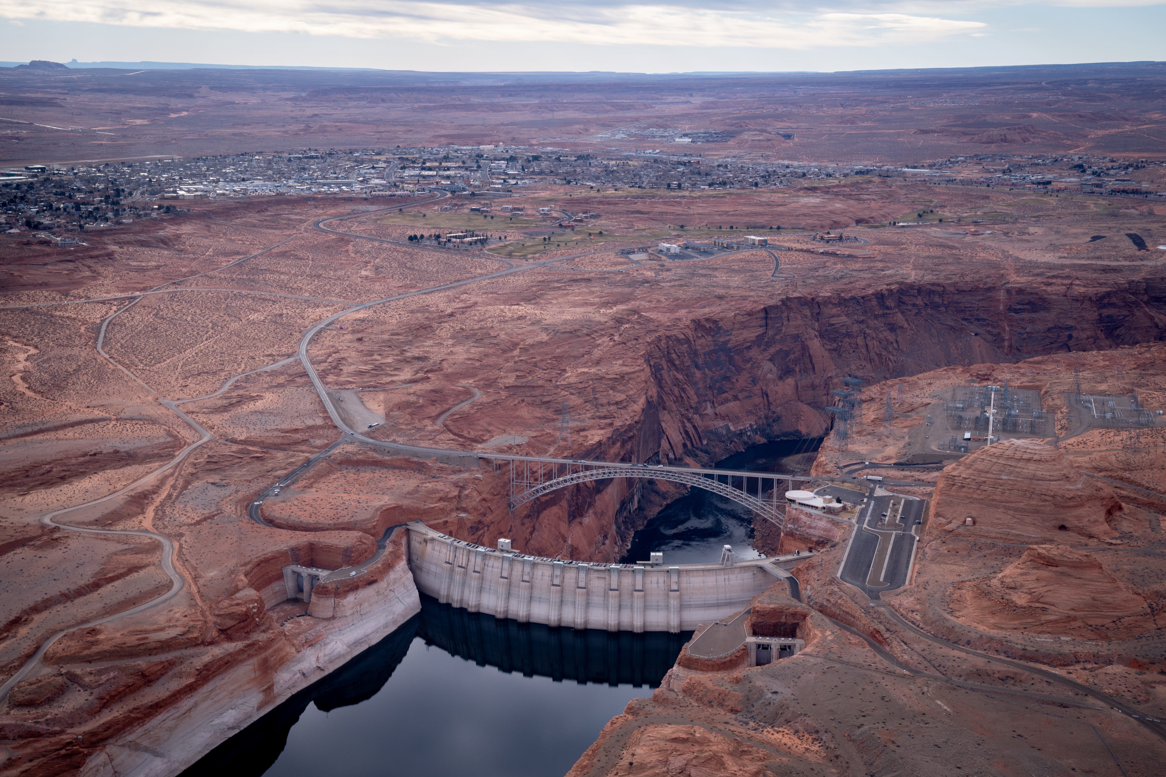 Glen Canyon Dam and Page as seen on Feb. 3, 2022. Page was founded in the late '50s as housing for those working on Glen Canyon Dam.