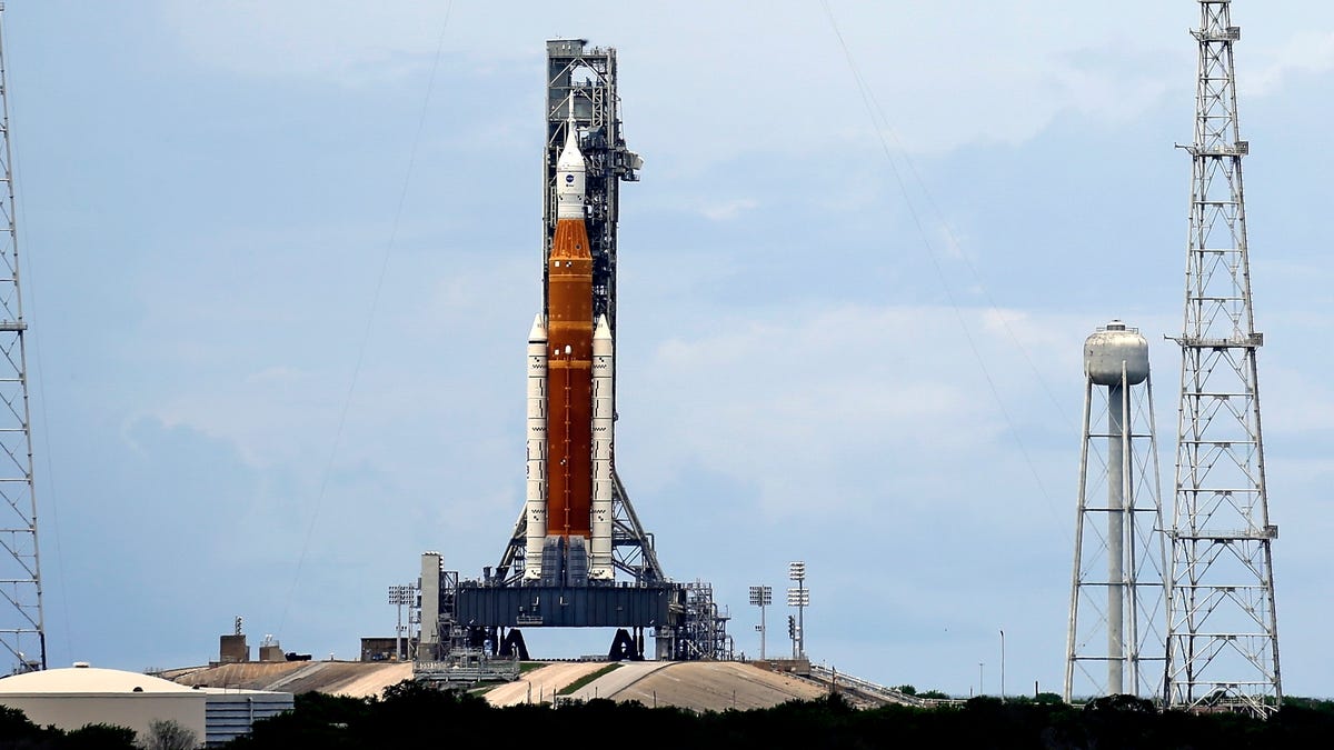 The NASA moon rocket stands ready less than 24 hours before it is scheduled to launch on Pad 39B for the Artemis 1 mission to orbit the moon at the Kennedy Space Center, Sunday, Aug. 28, 2022, in Cape Canaveral, Florida.