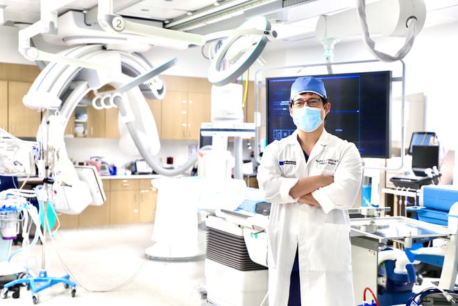 Dr. Bradley Trinidad, Vascular Surgeon M.D. of Northwest Texas Healthcare System standing in Amarillo's first hybrid operating room.