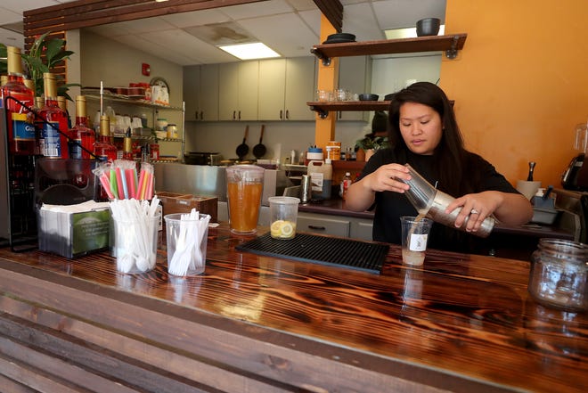 Sherly Pantouw-Jones makes a Calaman bubble tea at her Bubz cafe in East Bremerton on Tuesday. Pantouw-Jones said in opening Bubz, her family wanted to introduce a concept that doesn't yet have a presence in Kitsap County.