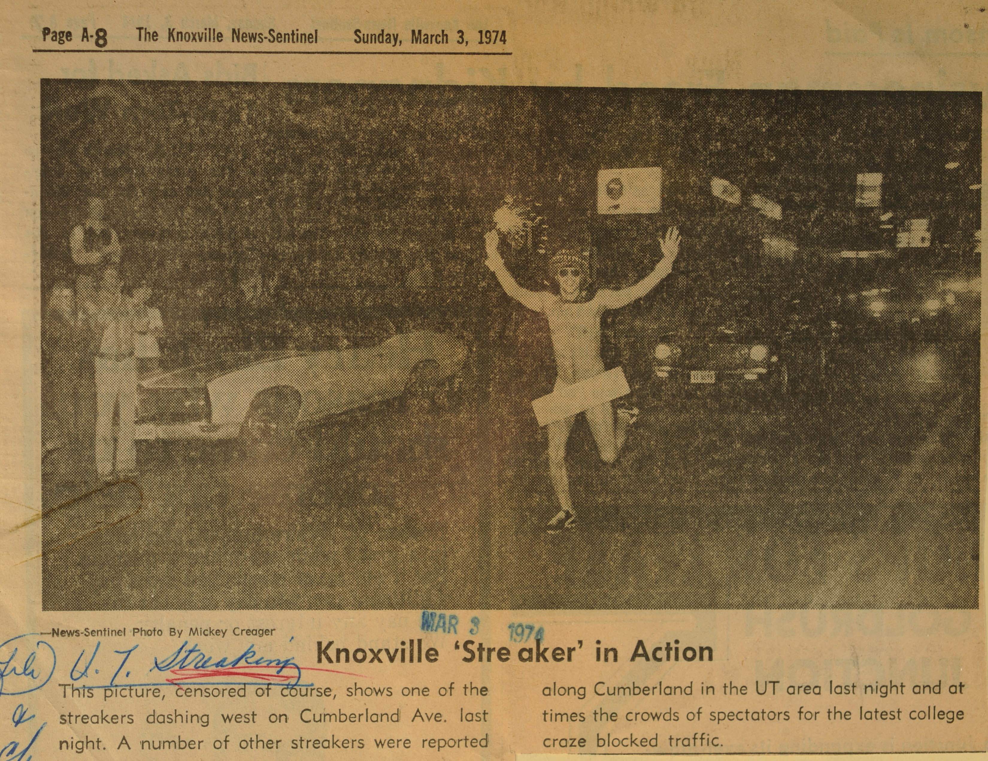 A clipping from the paper's March 3, 1974, edition shows photographer Mickey Creager's image of a streaker engaging in the latest college craze. The paper reported the young man - carrying a Fourth of July type sparkler and wearing only a hat, tie, sunglasses and shoes - jogged down Cumberland Avenue to the delight of some 350 spectators.
