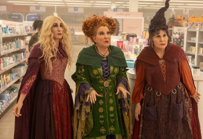 The Sanderson witch sisters – Sarah (Sarah Jessica Parker, L-R), Winifred (Bette Midler) and Mary (Kathy Najimy) – go wild on Salem again in the Disney+ sequel "Hocus Pocus 2."