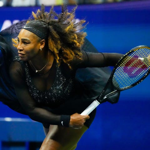 Serena Williams returns a volley to Danka Kovinic 