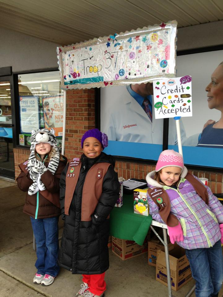 Madison Sparrow, right, with fellow Girl Scouts in February 2013.
