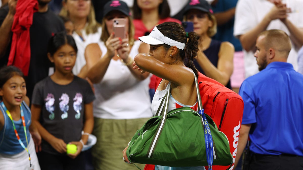 Britain's Emma Raducanu leaves the court after being defeated by France's Alize Cornet in first round.
