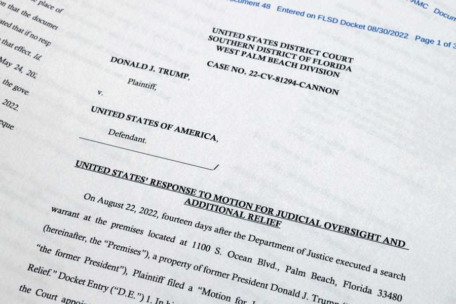 Pages from a Department of Justice court filing on Aug. 30, 2022, in response to a request from the legal team of former President Donald Trump for a special master to review the documents seized during the Aug. 8 search of Mar-a-Lago, are photographed early Wednesday, Aug. 31, 2022.