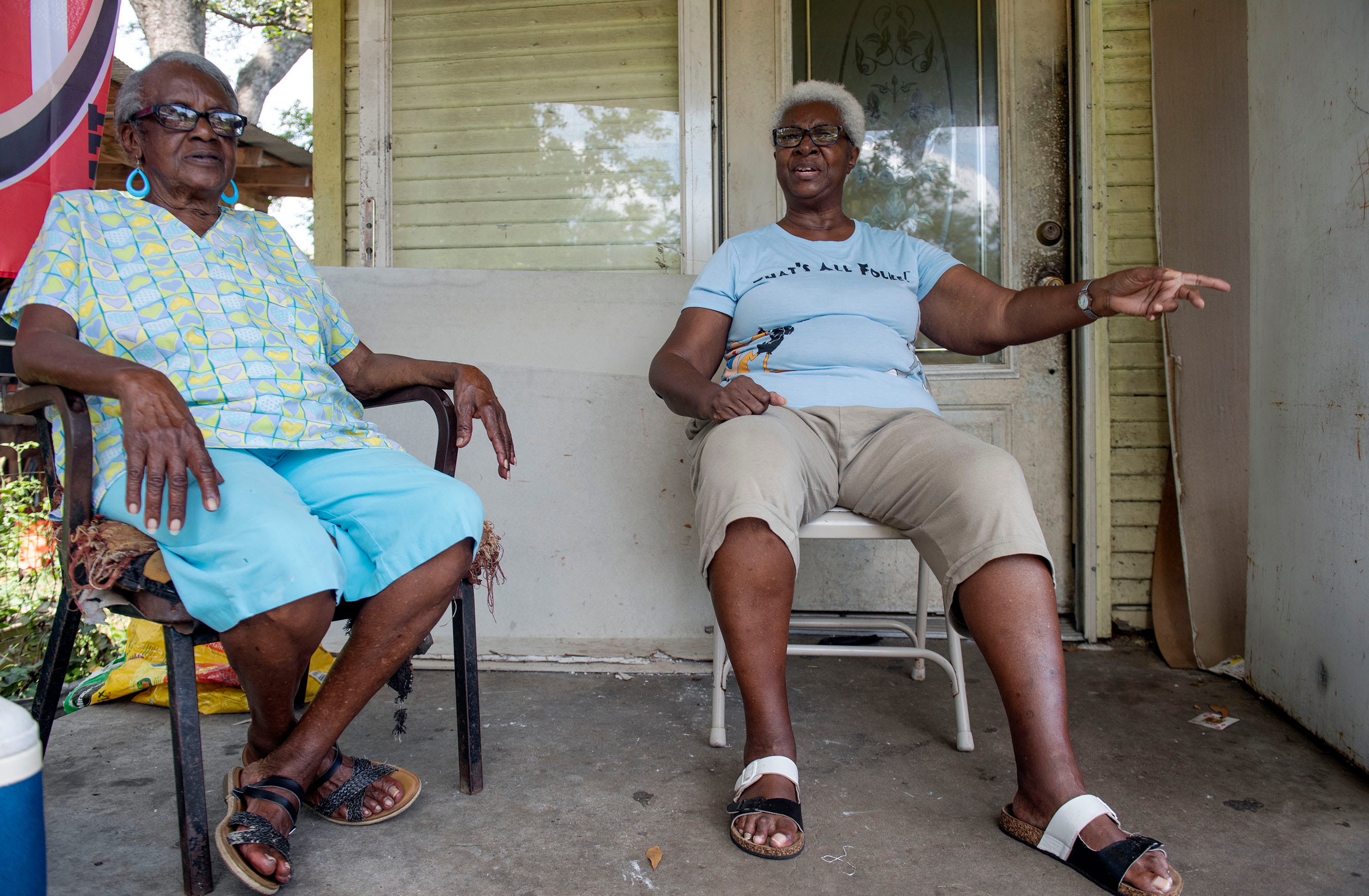 Bertha Anderson, 84, left, and neighbor Ruth Cotrell, 73, right, of Jackson, sit on Cottrell's porch talking about the city’s water crisis on Wednesday, Aug. 31, 2022.