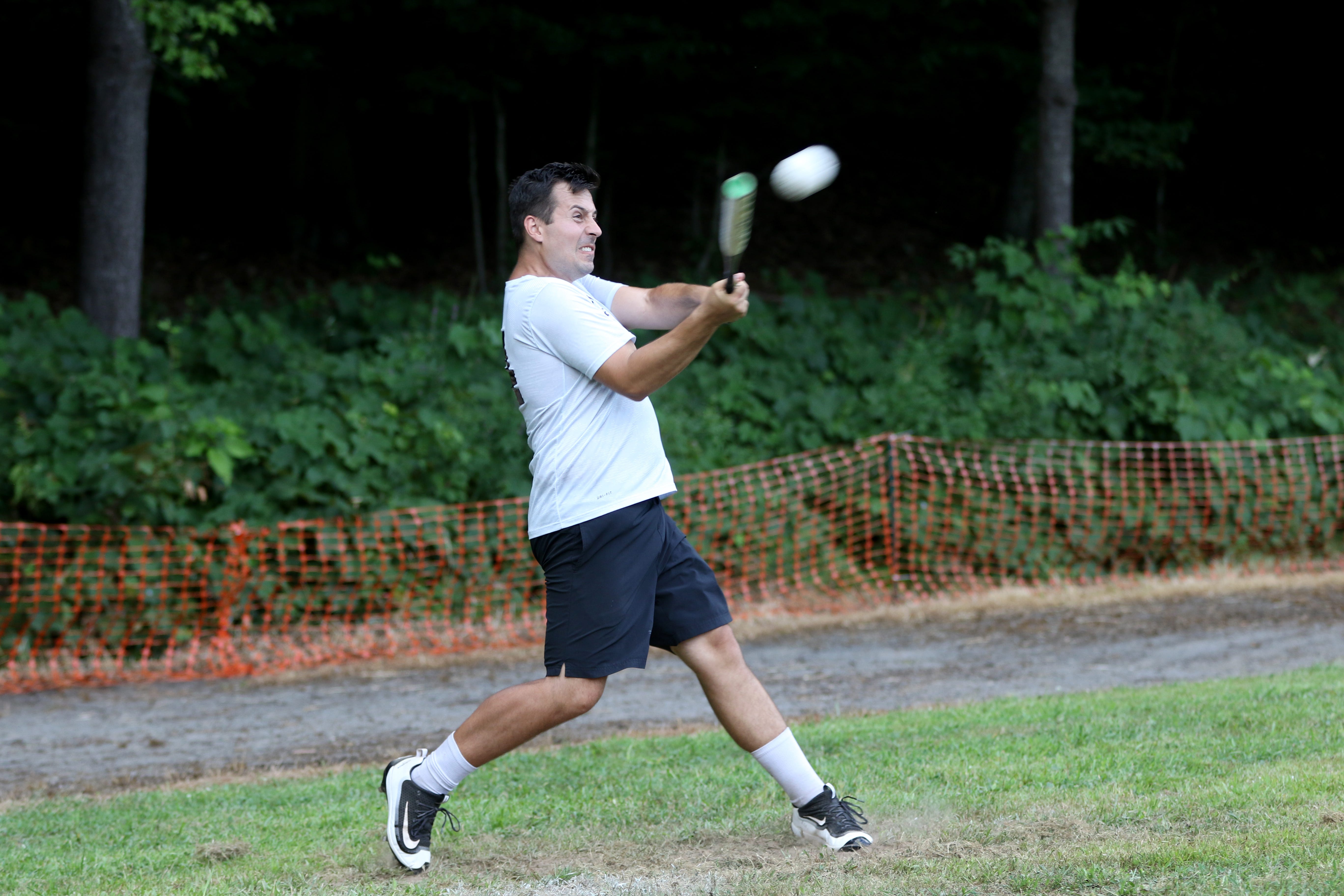 Peter Drobenko, of Haworth, New Jersey, connects during the softball tournament at the Ukrainian American Youth Association Resort Center on Saturday, Aug. 20, 2022.