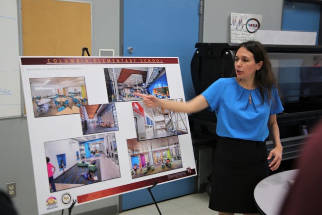 Architect Christina Garcia of Vigil and Associates shows conceptual design sketches as part of an interactive session hosted by the Las Cruces Public Schools seeking input into the design of the new Columbia Elementary School. The meeting was held at Vista Middle School in Las Cruces on Wednesday, Aug. 31, 2022.