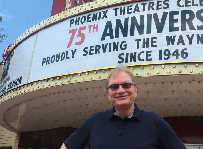 Phoenix Theatres owner Cory Jacobson stands outside the State Wayne Theater in downtown Wayne. The theater is in its 75th year since opening, with Phoenix Theatres operating the historic building since 2012.