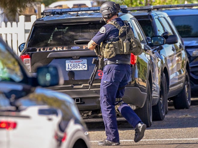 Tulare Police negotiate with a juvenile Wednesday, August 31, 2022, in the 1300 block of West King Avenue. The 17-year-old refused to come outside for hours and streets in the area were closed.