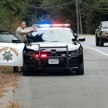 Aug 31, 2022; Crescent City, Or, usa; Aug. 31, 2022; Crescent City, Calif., USA We photograph California Highway patrol officer Ted Luna who is investigating a hit and run accident that left a cyclist dead.. Mandatory Credit: Steve Johnson, For USA TODAY