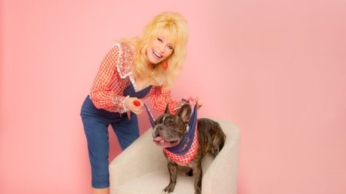 Dolly Parton with her dog, Billy The Kid