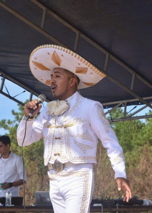 Mariachi Jorge Alvarado sings at Festival Latino at Ogden Park in 2016. This year's festival is Nov. 5-6.
