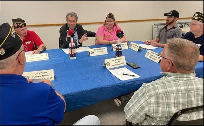 Sen. Sherrod Brown, center, recently met with military veterans in Zanesville to discuss legislation for those exposed to toxic burn pits.