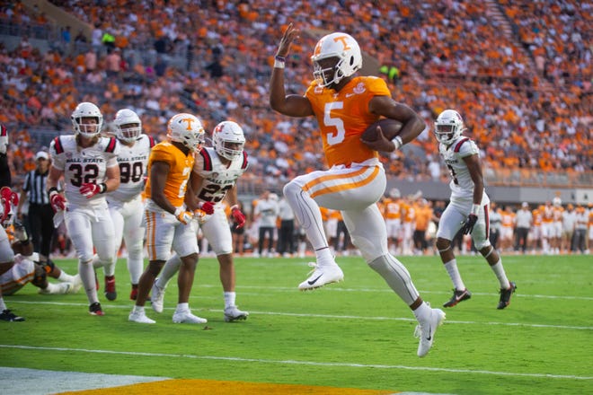 Tennessee quarterback Hendon Hooker (5) jumps into the end zone during the Tennessee vs Ball State football game in Neyland Stadium, Knoxville, Tenn. on Thursday, Sept. 1, 2022.
