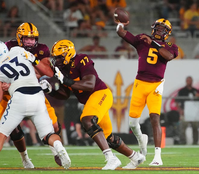 Arizona State quarterback Emory Jones (5) throws a pass against Northern Arizona Thursday at Sun Devil Stadium.