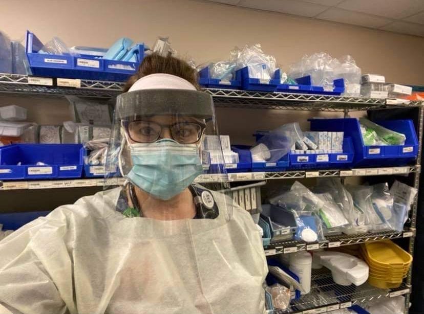 Suzanne Barnes, a nurse at St. Elizabeth Medical Center in Utica, photographed in personal protective equipment.
