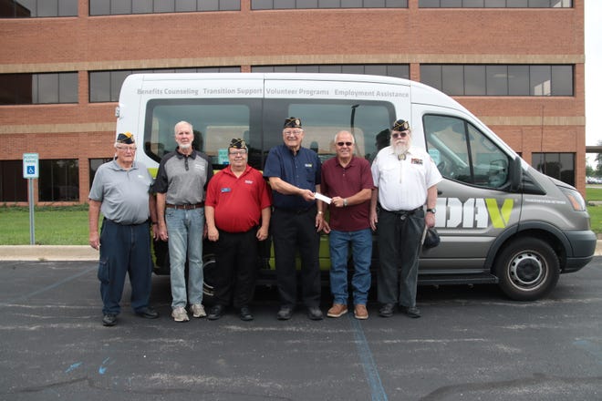 Organizers of an antique tractor poker run on Aug. 13, 2022, present a donation of $16,000 to Disabled American Veterans Chapter 20's van fund Monday, Aug. 29, 2022, in Adrian. Pictured from left are Gerald Cool, Bill Bailey, DAV Chapter Commander Paul Dye, Ron Whitford, Steve Sommers and Jeff Rose.