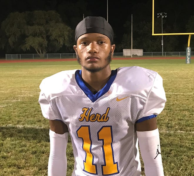 Woodbury's JaBron Solomon delivered a huge game with two touchdowns catches and an interception as the Thundering Herd earned their first win over West Deptford in over two decades on Friday night.