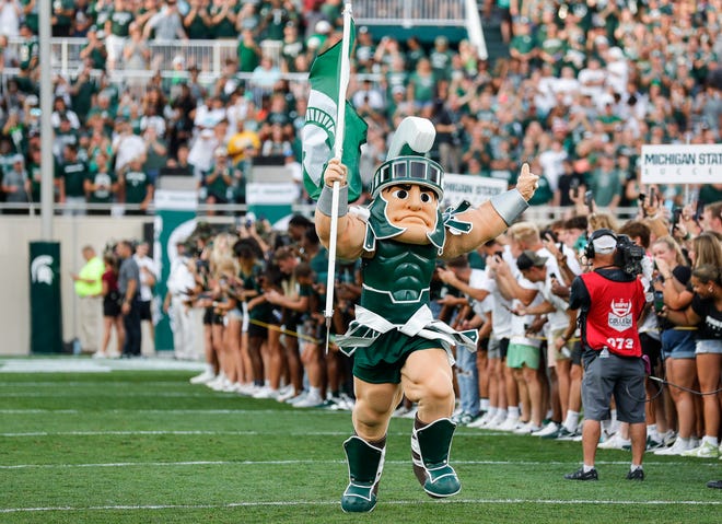 Sparty takes the field before the game between Michigan State and Western Michigan at Spartan Stadium in East Lansing on Friday, Sept.  2, 2022.