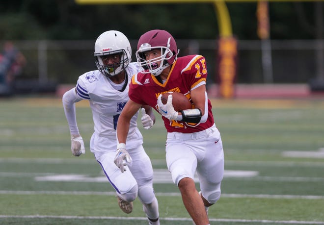 McCutcheon Mavericks wide receiver Mark Fell (15) runs the ball during the IHSAA football game against the Muncie Central Bearcats, Friday, Sep. 2, 2022, at Ellison Stadium in Lafayette, Ind.