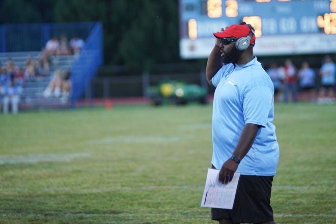 Ridgedale head football coach Corey Chatman watches from the sidelines during a home game with Franklin Furnace Green this season.