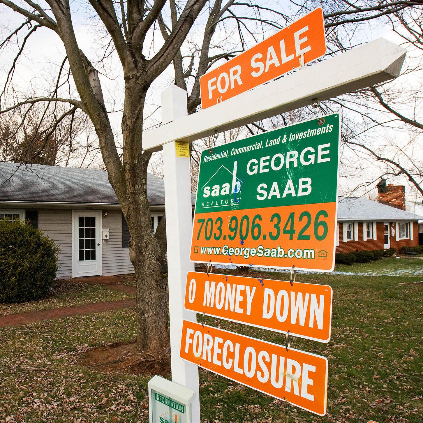 A home for sale is seen January 24, 2008 in Manassas, Virginia. The mortgage crisis has created a new industry for developers buying foreclosed or auctioned homes at cheap prices, then reselling them for a profit.  