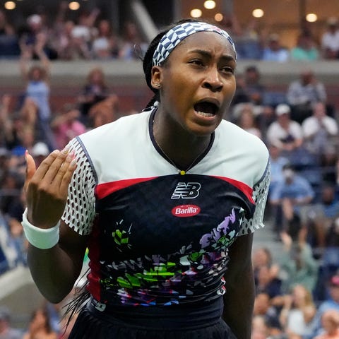 Coco Gauff reacts after winning a point during her