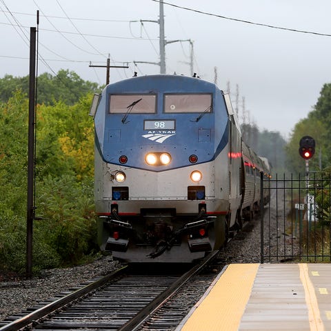 An Amtrak train pulls into the Durham station on T