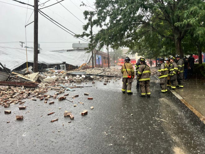 Part of a commercial building collapsed at Dexter and Waverly streets in Providence in Monday's heavy rain.