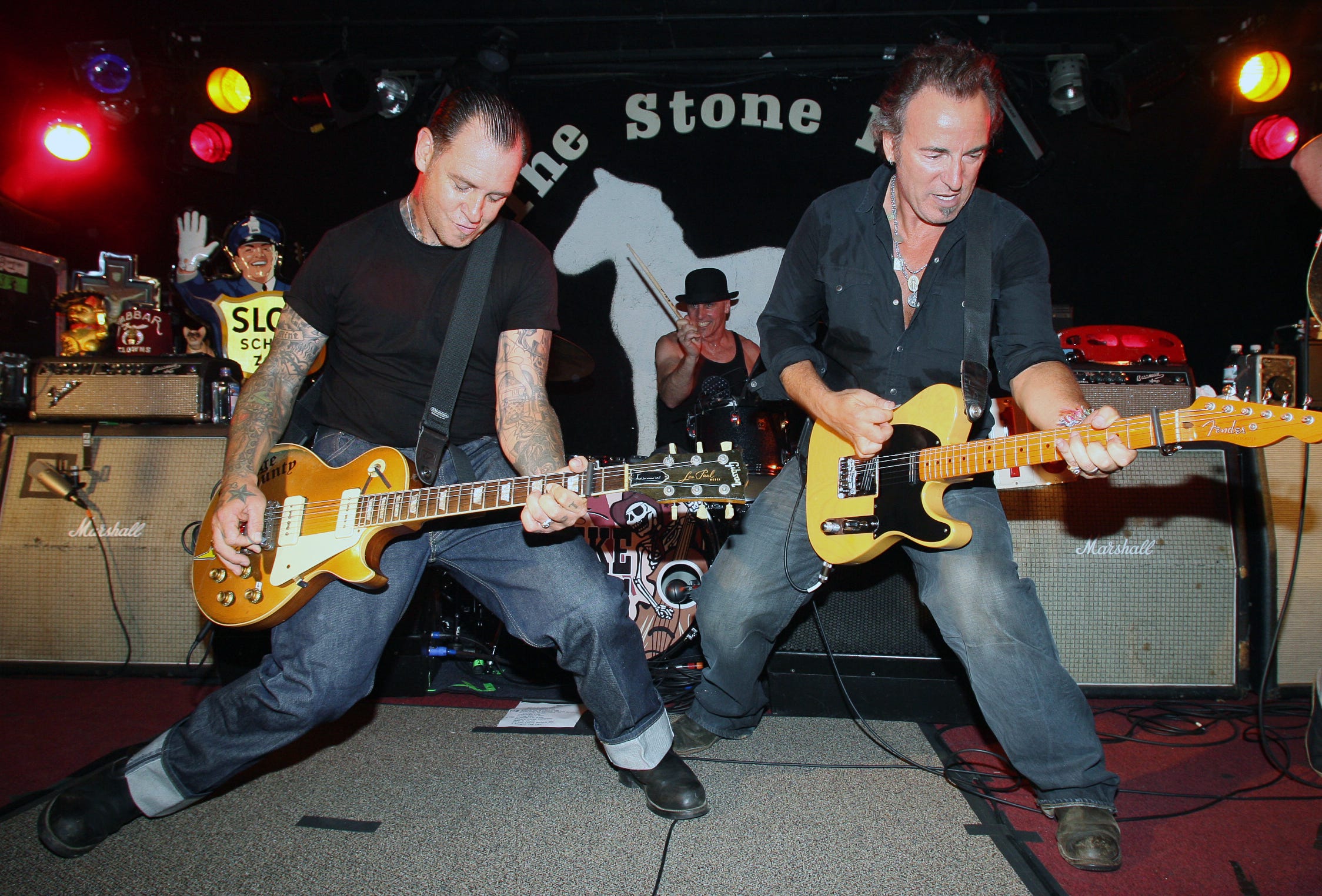 Mike Ness (left) of Social Distortion fame is joined by Bruce Springsteen at the Stone Pony in May 2008.