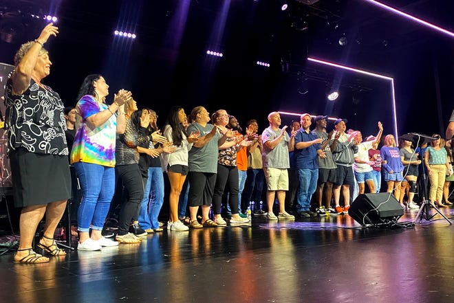 A "Unite OKC" choir made up of members of different churches sings during a rehearsal on Tuesday at Victory Church in Warr Acres.  [Carla Hinton/The Oklahoman]