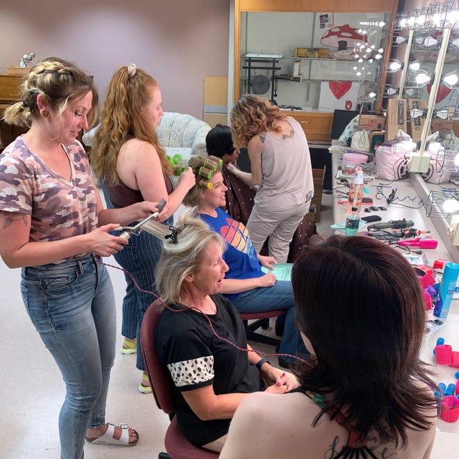 Steel Magnolias cast members sat down to a hair styling session recently to prepare for their stage performance later this month. Styling the hair are, front to back, Rachel Aman, Haley Salem and Michelle Ivy. Seated are Rebecca Mattern, Rachel Hemke and Rosemary Vega.