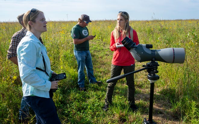 Caitlin Looby, right, is a Milwaukee Journal Sentinel environmental reporter focused on the Great Lakes, and in the newsroom via the Report for America program. She is shown at work at the headwaters of Trout Creek on the Oneida Reservation in Oneida, Wis.