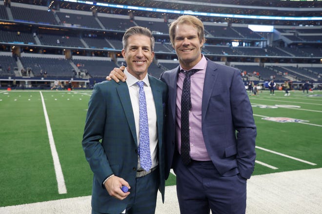 FOX Sports play-by-play announcer Kevin Burkhardt, left, with game analyst Greg Olsen, right, prior to an NFL Football game in Arlington, Texas, Sunday, Nov. 7, 2021.