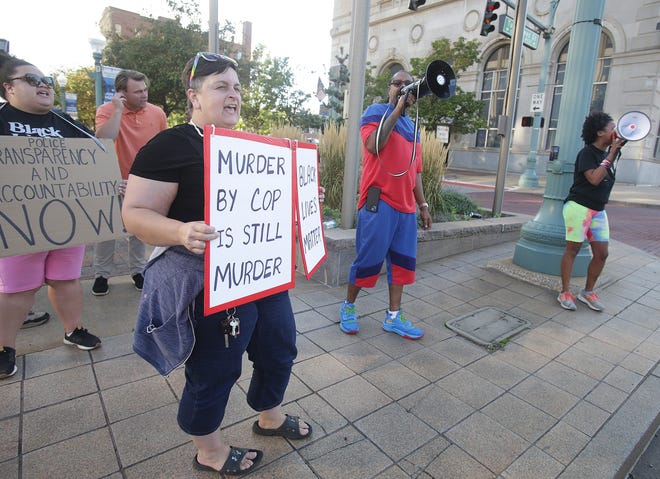 Protestors gathered at Central Plaza in downtown Canton Wednesday afternoon after news that the Canton police officer involved in the New Year's Day fatal shooting of James Williams will not face criminal charges.