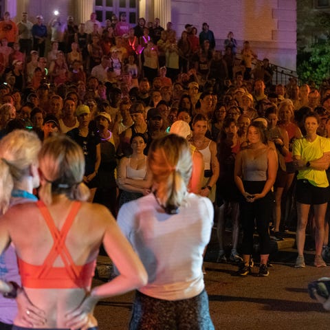 Runners attend the Let's Finish Liza's Run event o