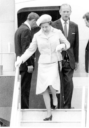 Queen Elizabeth II and Prince Philip arrive at Palm Springs Airport in 1983.