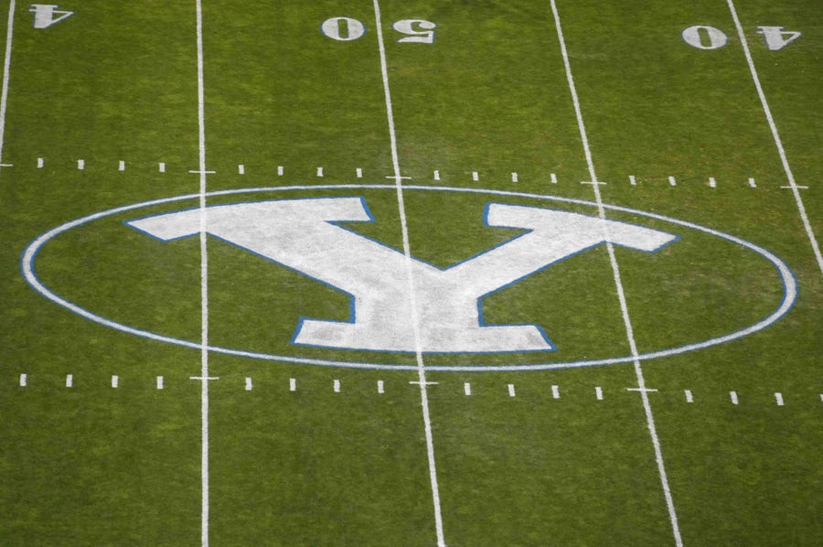 BYU's logo on the football field at LaVell Edwards Stadium..