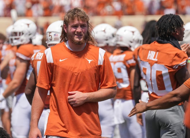 Texas quarterback Quinn Ewers spent the final three quarters of the Longhorns' 20-19 loss to then-No.  1 Alabama on the sidelines.  He suffered a sprained clavicle late in the first quarter.
