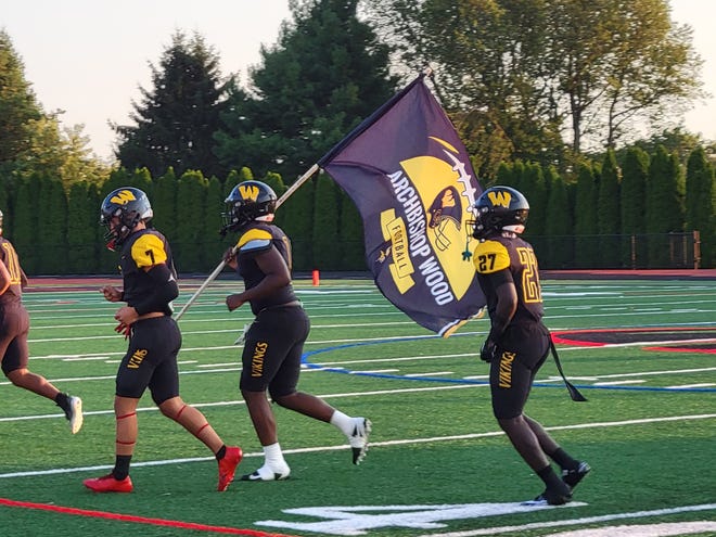 Archbishop Wood football players take the field before the Vikings' first game of the year against Malvern Prep on September 9.  The Vikings fell, 21-3, to the Friars.