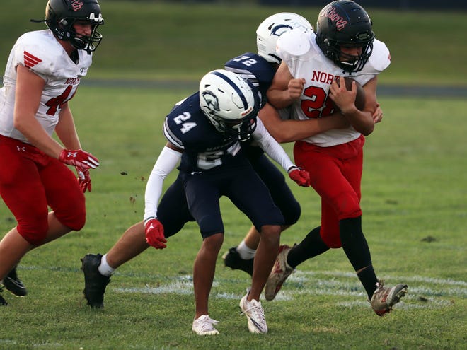 North Hagerstown's Fletcher Lewis carries the ball against Manchester Valley on Sept. 9, 2022.