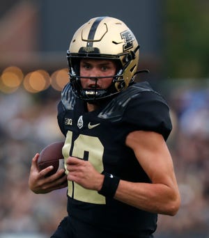 Purdue Boilermakers quarterback Austin Burton (12) rushes the ball during the NCAA football game against the Indiana State Sycamores, Saturday, Sept. 10, 2022, at Ross-Ade Stadium in West Lafayette, Ind. Purdue won 56-0.