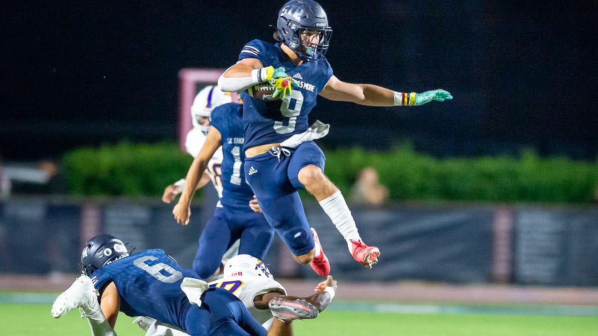 See photos as the STM Cougars take on Alexandria Football