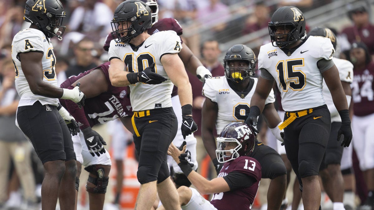 Appalachian State linebacker Logan Doublin (40) celebrates his sack against Texas A&M quarterback Haynes King (13) in the second quarter  at Kyle Field.