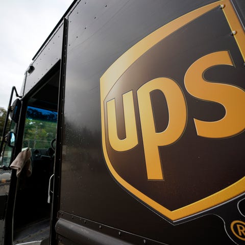 This is the UPS logo on the side of a delivery tru