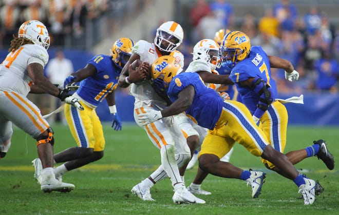 Hendon Hooker (5) of the Tennessee Volunteers gets sacked by Calijah Kancey (8) of the Pittsburgh Panthers during the second half at Acrisure Stadium in Pittsburgh, PA on Spetmebr 10, 2022. 